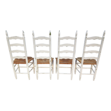 Load image into Gallery viewer, Vintage Farmhouse Chippy White Painted Rush Seat Ladderback Dining Chairs - Set Of 4