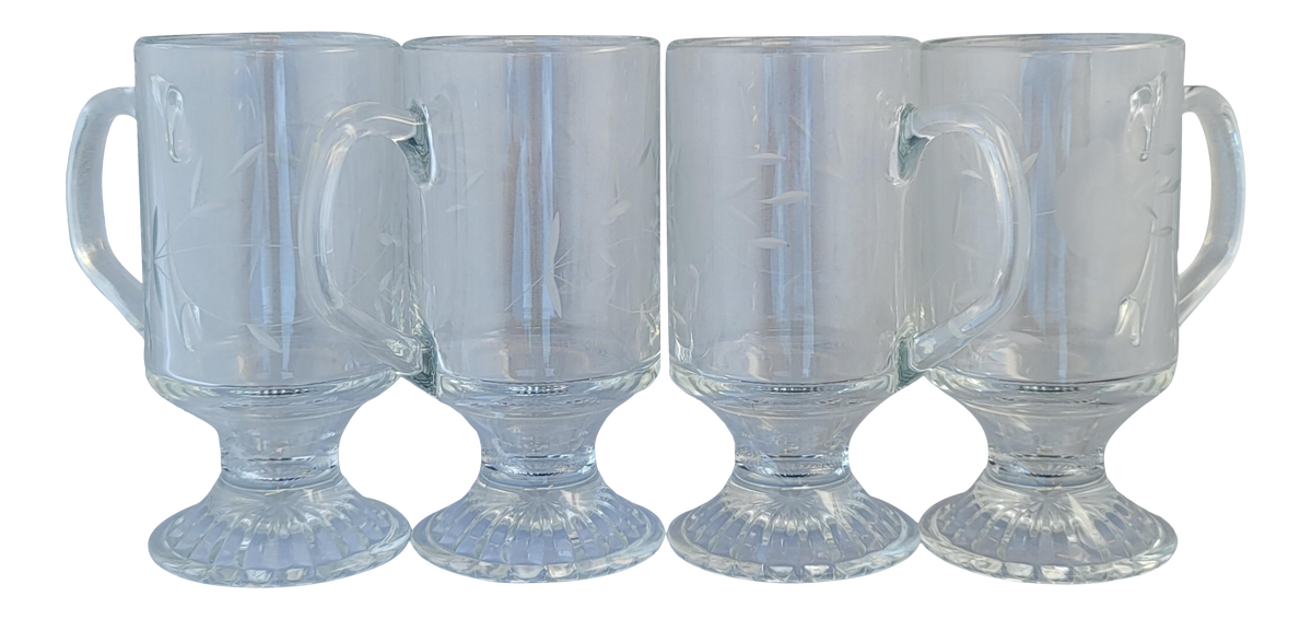 http://eclecticcollective.com/cdn/shop/products/vintage-1960s-princess-house-footed-clear-pressed-cut-glass-mugs-latte-glasses-set-of-4-8484_1200x1200.png?v=1616126260