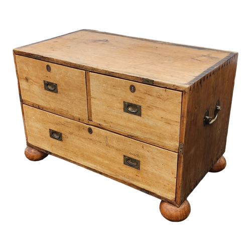 Antique Primitive Bun Footed Campaign Chest In Natural Finish at EclecticCollective.com - Main Product Photo