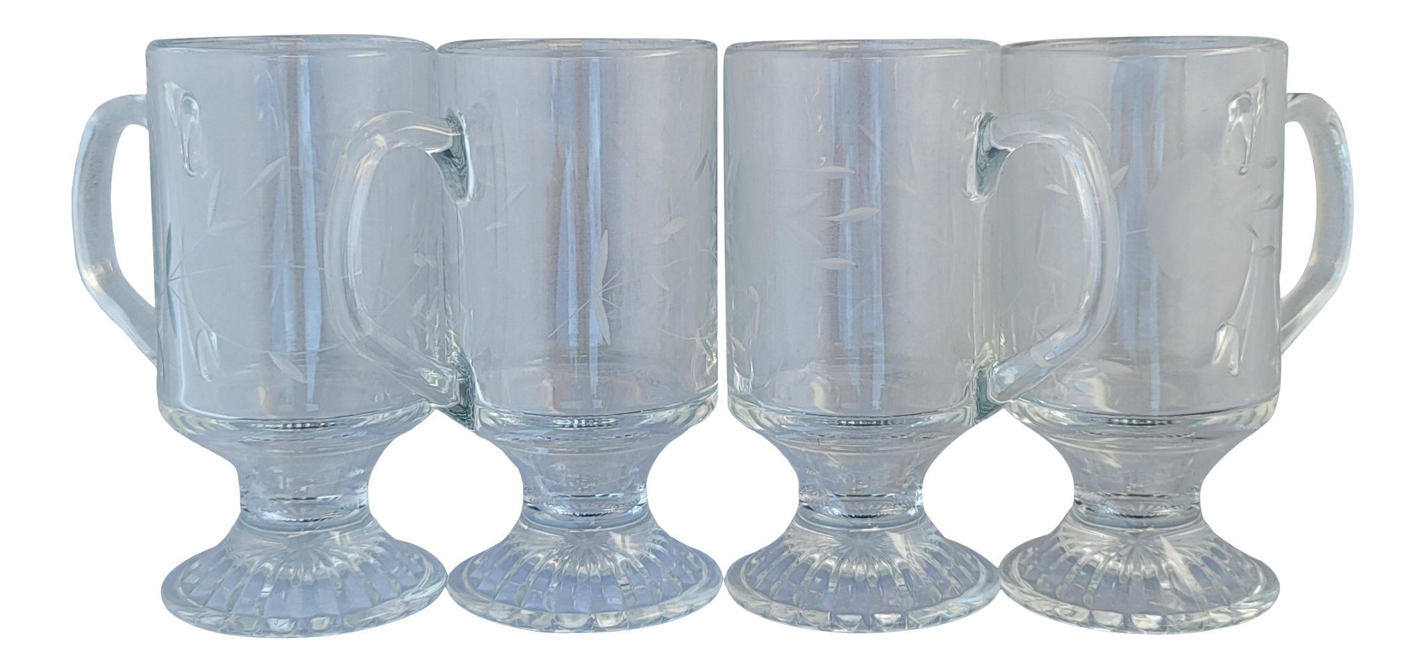 https://eclecticcollective.com/cdn/shop/products/vintage-1960s-princess-house-footed-clear-pressed-cut-glass-mugs-latte-glasses-set-of-4-8484_1024x1024@2x.png?v=1616126260